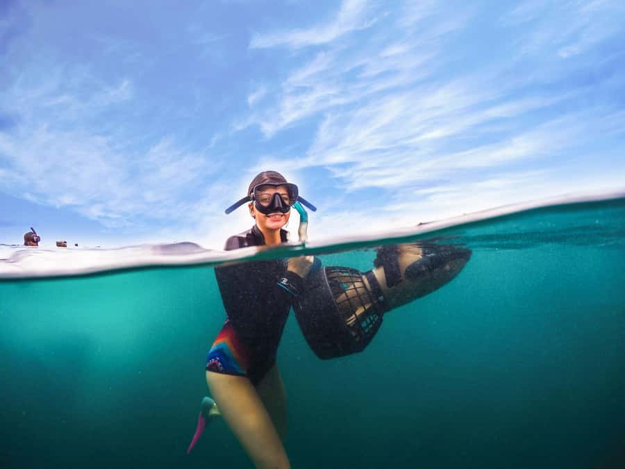 Brisbane: Moreton Island Return Ferry & Adventure Day Pass - Stand-up paddleboarding and slower island time