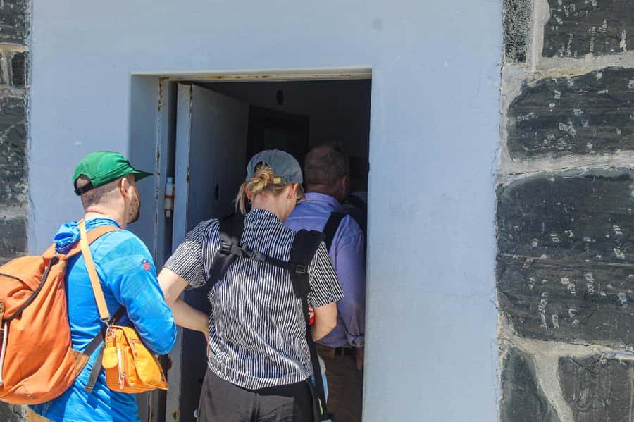 Cape Town: Robben Island ferry ticket plus Guided Tour - Four hours, crowded transport, and a possible return wait