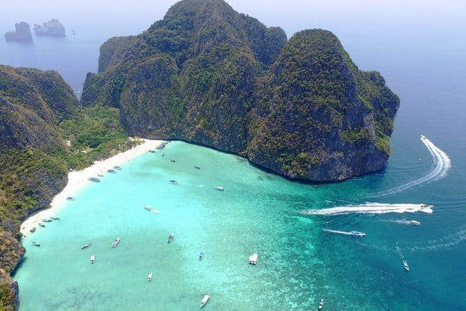 Explore Phi Phi Islands by Ferry – Snorkeling & Lunch Included - Seeing Maya Bay beneath the limestone cliffs