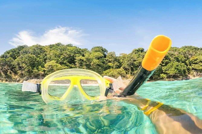 Phi Phi Islands Adventure: Ferry, Snorkeling & Island Lunch - Maya Bay and the cliffs of Phi Phi Leh