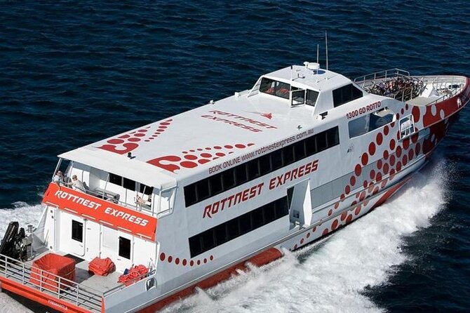 A fast ferry running out of the harbour at speed
