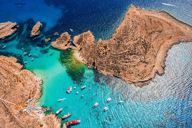 Roundtrip Ferry to Comino Blue Lagoon with Gozo Option - A scenic route past Comino’s sea caves