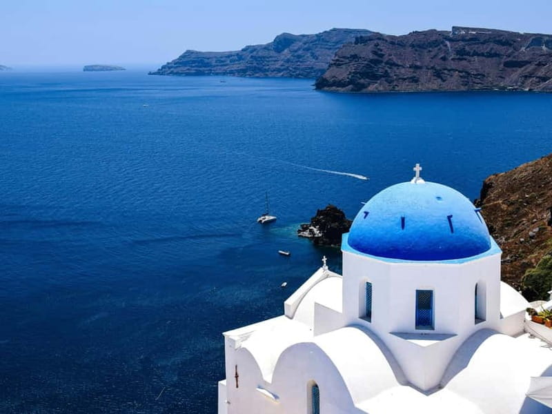 Santorini Guided Day Trip From Crete with Ferry Tickets - Arrival in Santorini and the island coach