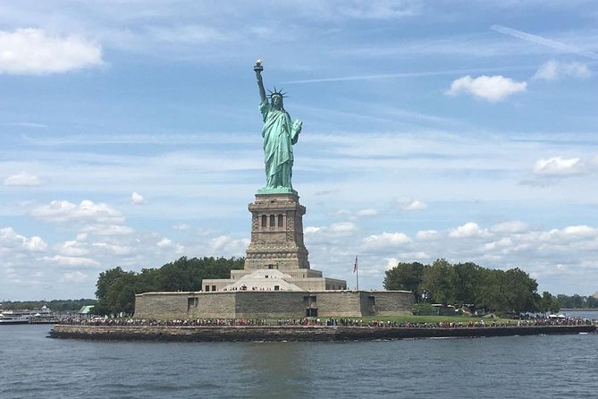 Statue of Liberty Ellis Island Ferry Ticket with Upgrade Options - Liberty Island: photographs first, interpretation second